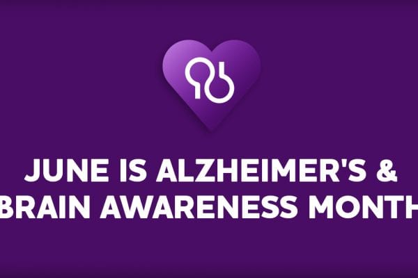 Purple heart with Alzheimer's awareness ribbon and brain icon.