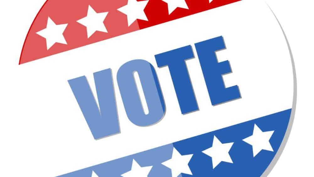 Vote sticker with red, white, and blue stars for early voting in Riverside Township.
