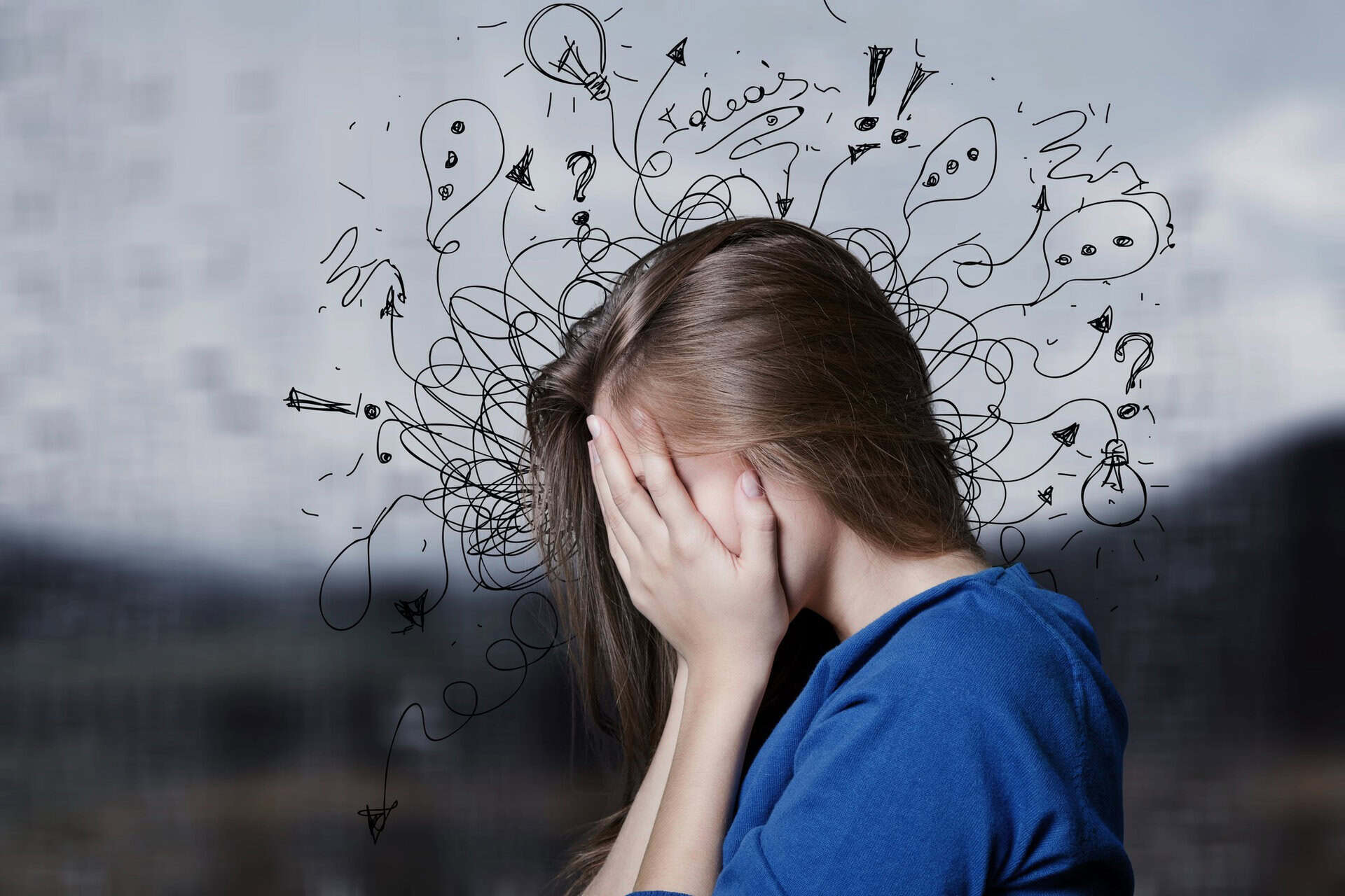 Teen girl with head in hands, surrounded by confusing question marks and symbols.